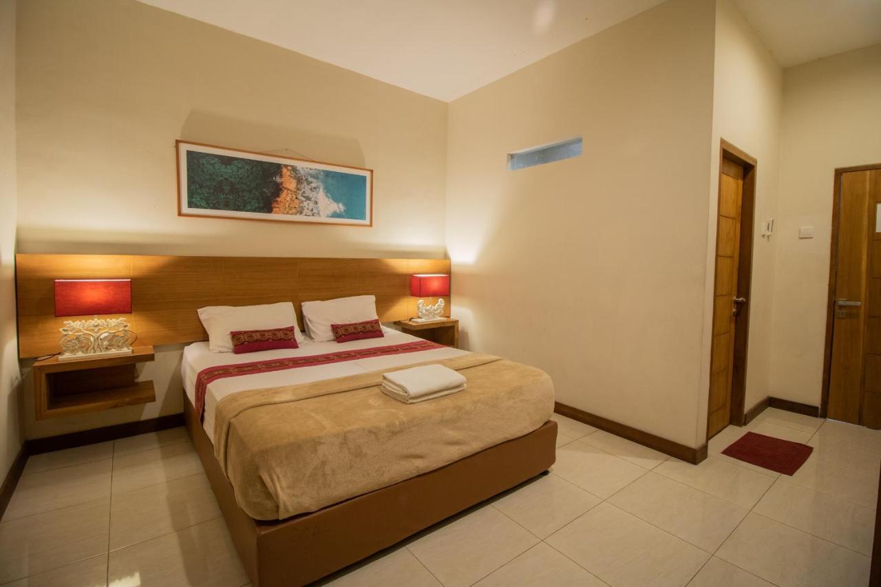 Kuta Suci Guesthouse 外观 照片