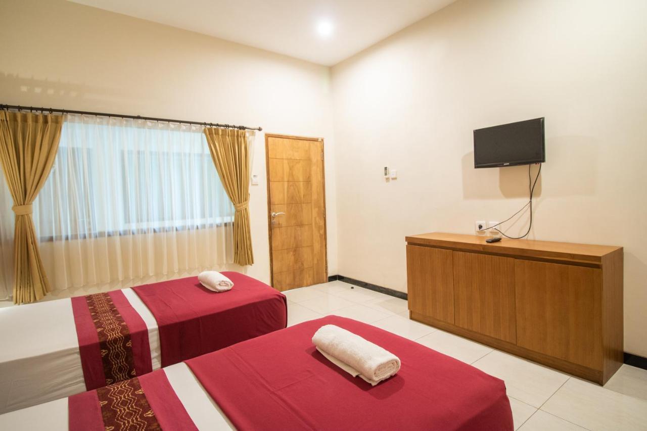 Kuta Suci Guesthouse 外观 照片
