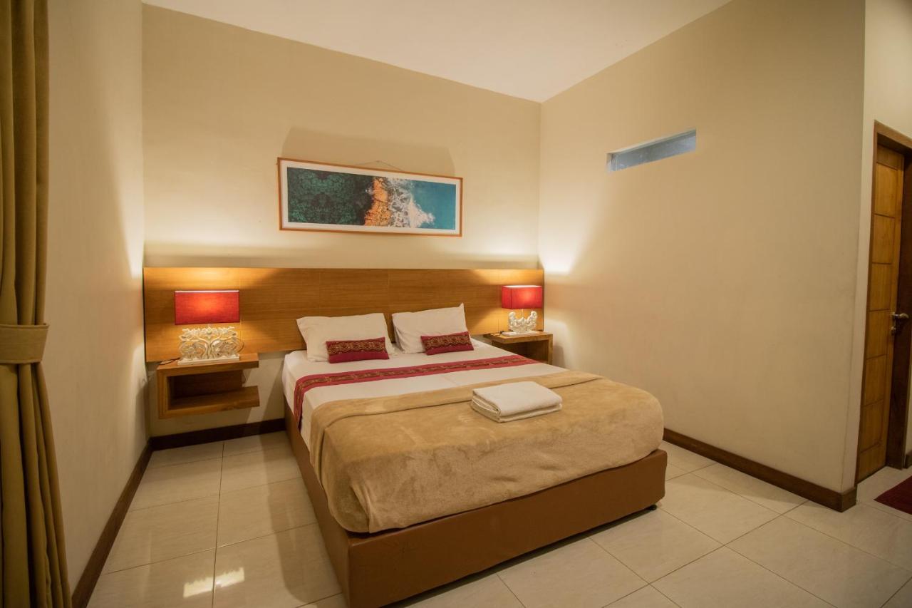 Kuta Suci Guesthouse 外观 照片