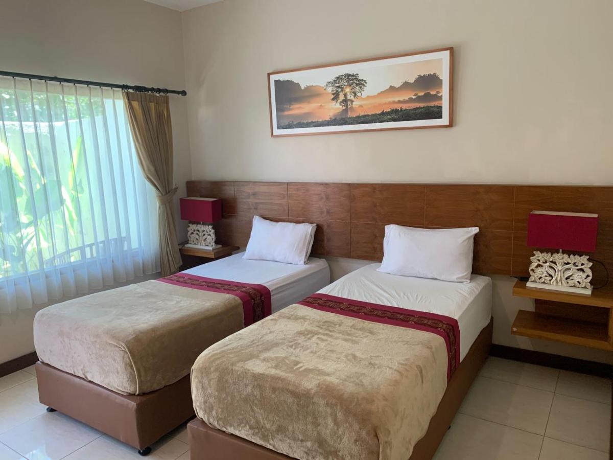 Kuta Suci Guesthouse 外观 照片