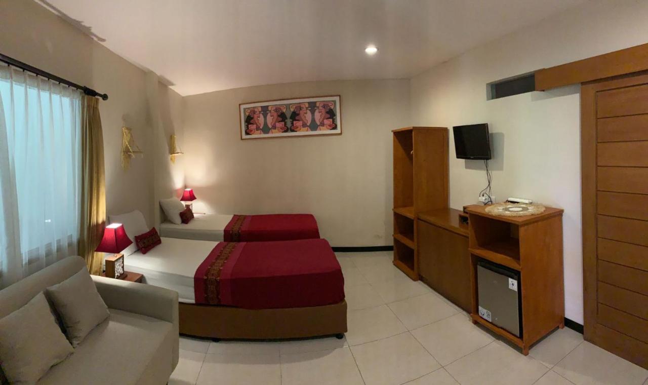 Kuta Suci Guesthouse 外观 照片