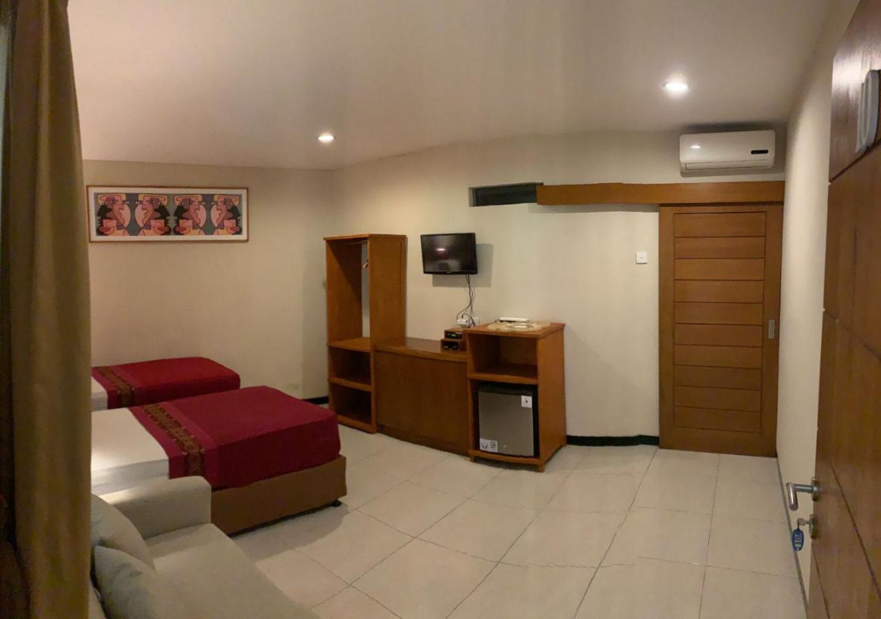 Kuta Suci Guesthouse 外观 照片
