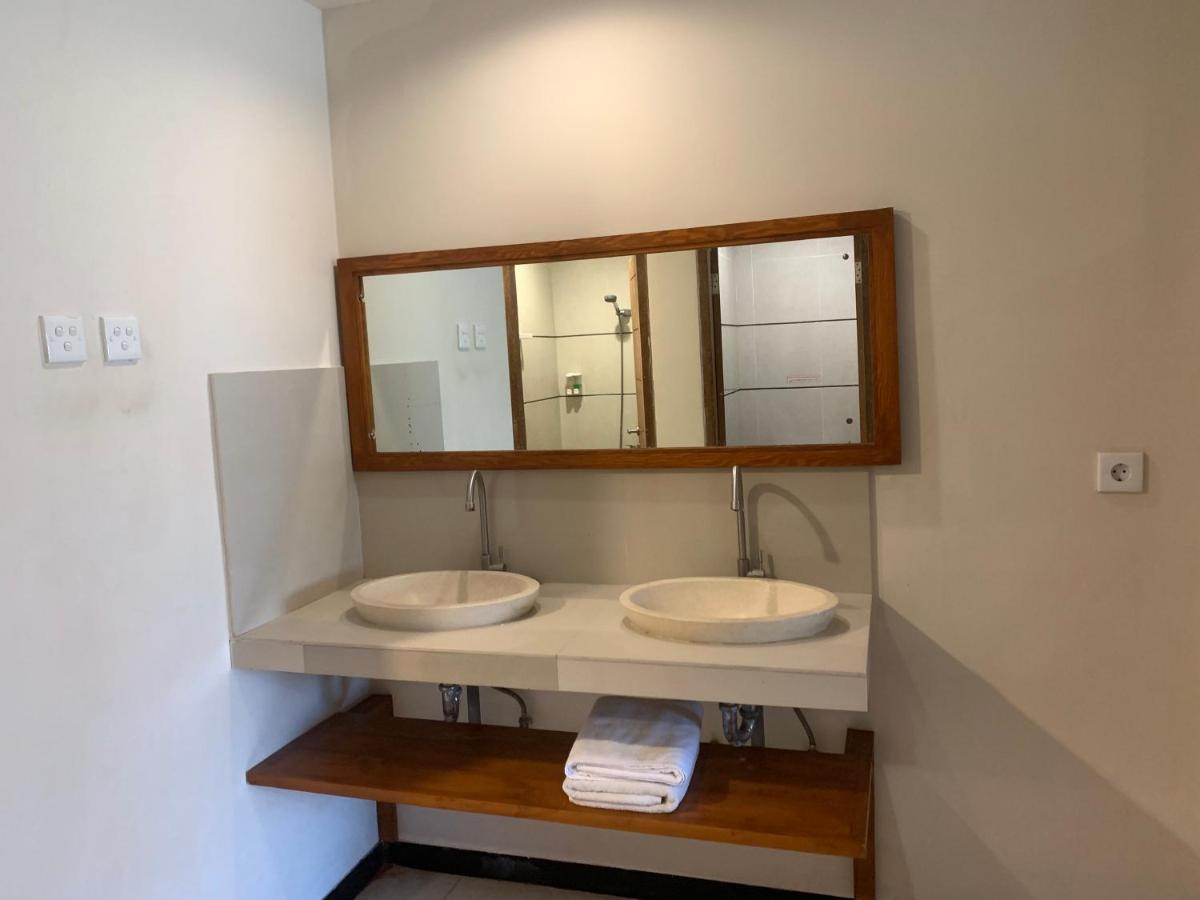 Kuta Suci Guesthouse 外观 照片