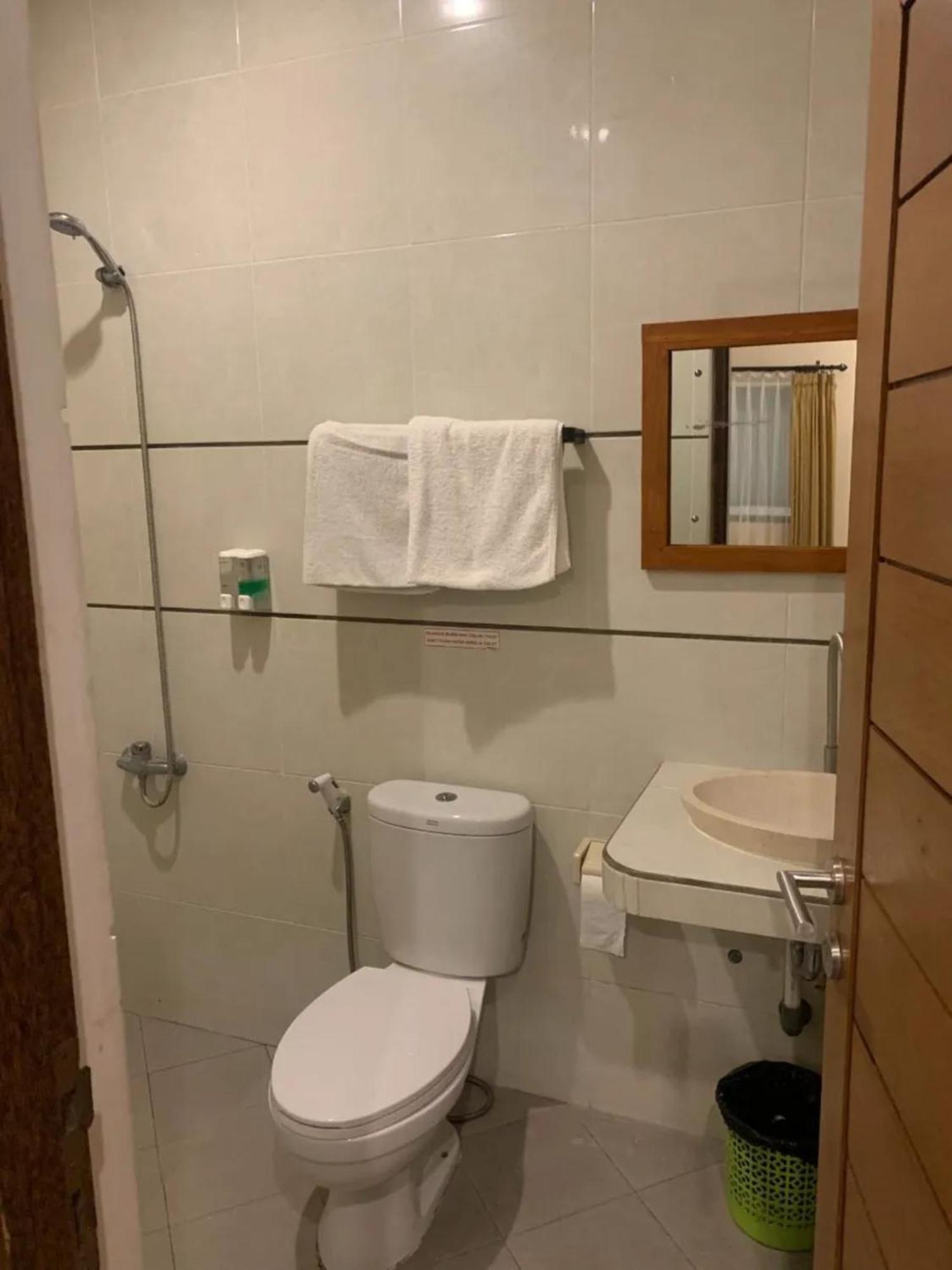 Kuta Suci Guesthouse 外观 照片