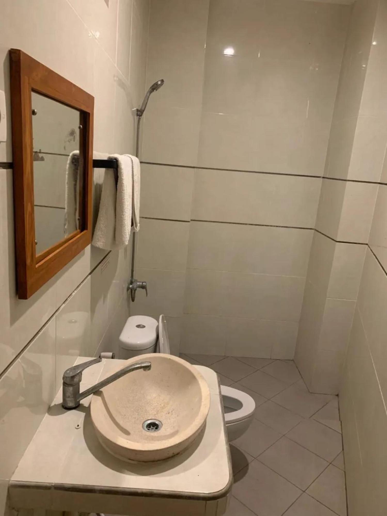 Kuta Suci Guesthouse 外观 照片